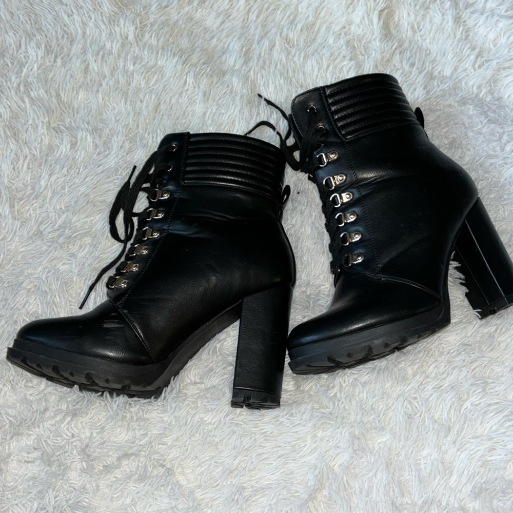 High heeled combat boots